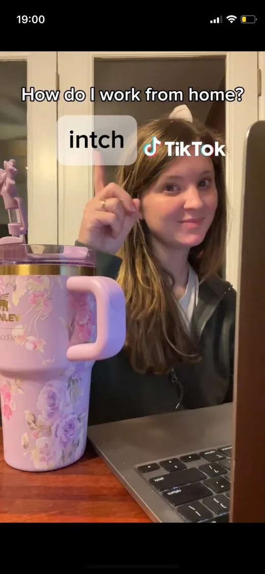 TikTok video frame of a woman at her laptop with the caption "How do I work from home?" pointing to the answer: Intch.