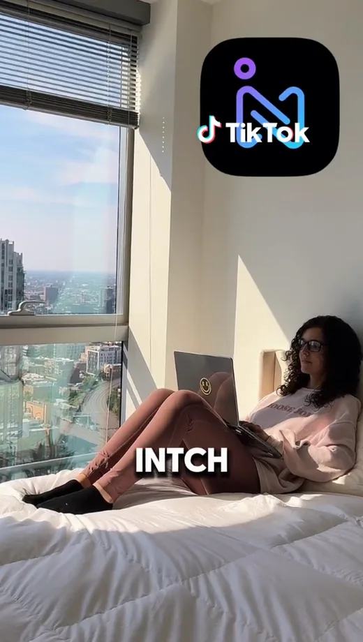 TikTok video frame showing the Intch app logo and the caption "Intch" as a woman works on her laptop, recommending the app for finding side gigs.