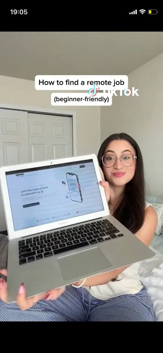 TikTok video of a woman holding up a laptop showing the Intch website, captioned as a beginner-friendly guide to finding a remote job.